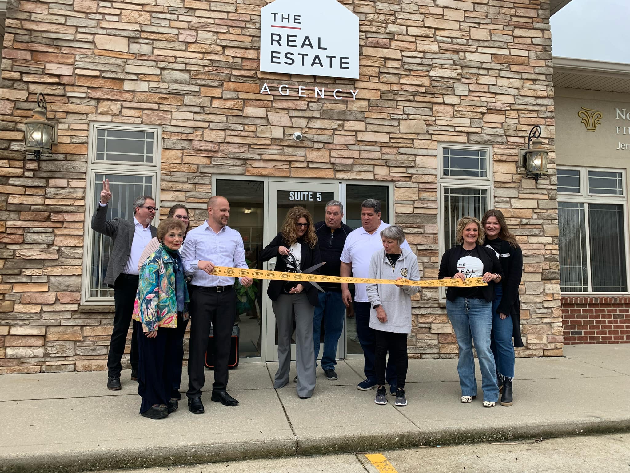 GRAND OPENING THE REAL ESTATE AGENCY Greater Lafayette Commerce